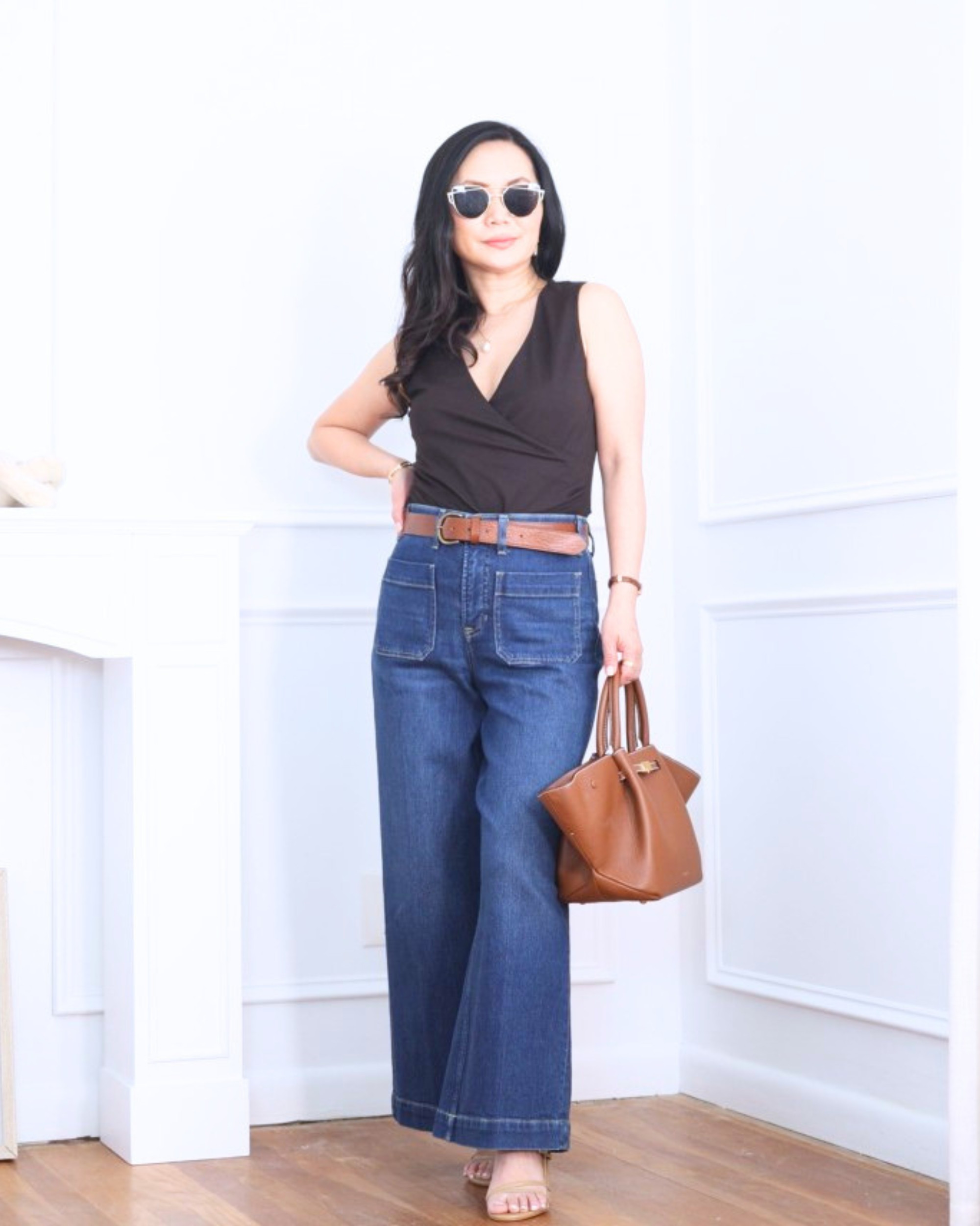 Ruched wrap top from Mango paired with wide-leg jeans from Spanx and heels from Quince — flattering, effortless, and the perfect mix of relaxed and polished. I’m 5’2, wearing size XS.

#LTKOver40 #LTKPetite #LTKootd