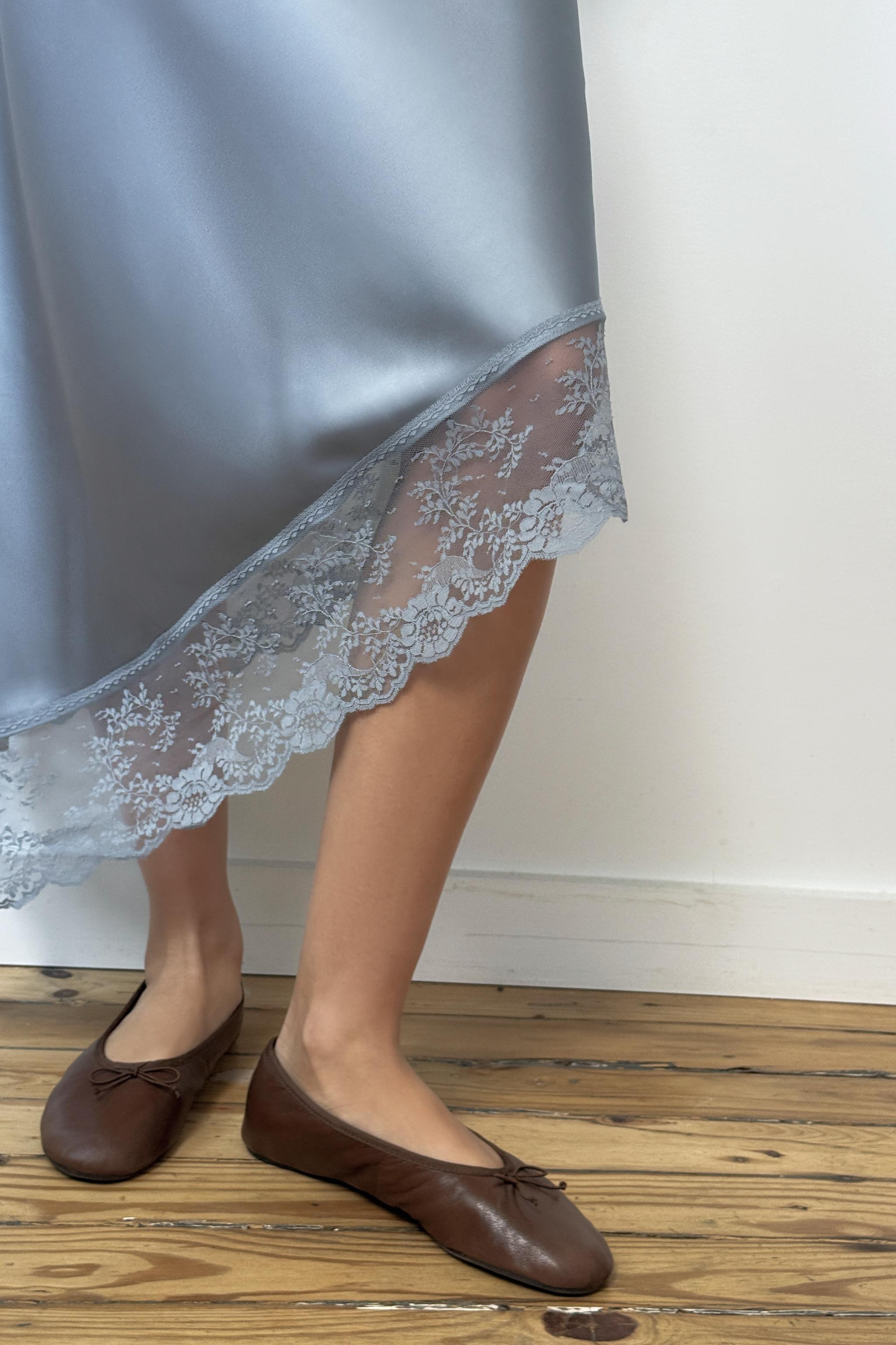 SATIN EFFECT MIDI SKIRT WITH ASYMMETRIC HEM AND LACE | Zara US