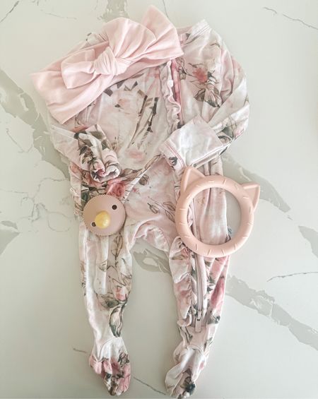 Precious pink floral baby onesie paired with a pink bow! Easy to put on and off with the zipper. I love the ruffle detailing and floral pattern for summer. 

#LTKbaby #LTKstyletip
