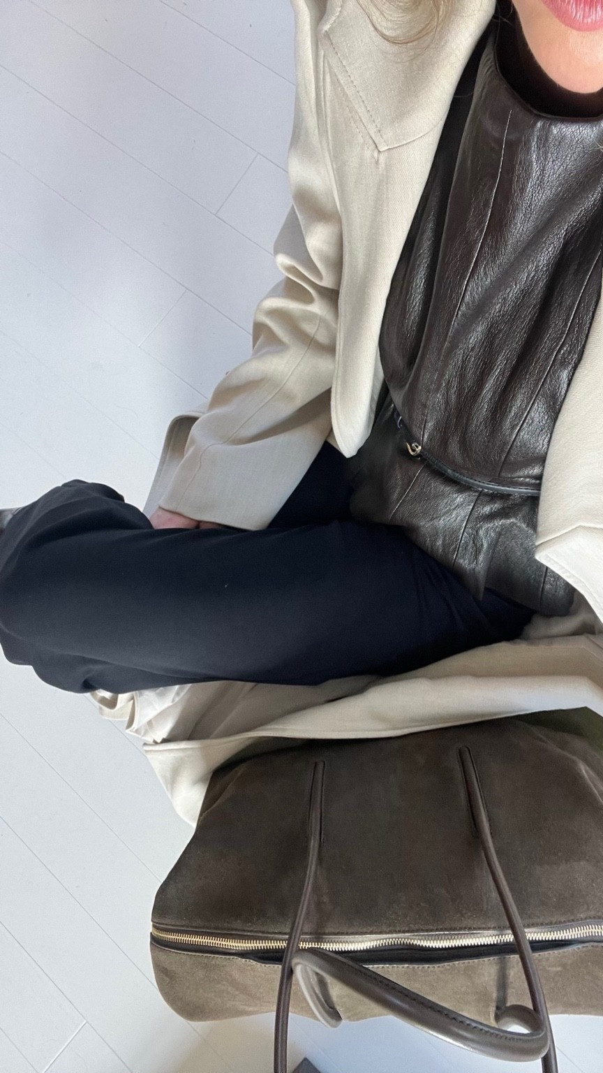 Suede handbag, brown suede bag, suede tote bag, demellier, trench cost, cream coat, black trousers, leather top, Zara, belted top 

#LTKbag #LTKFashionMonth #LTKspring