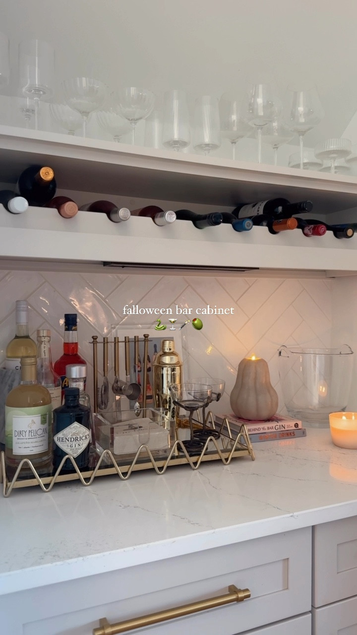 falloween bar cabinet styling 🐍 | all functional + chic and not cheesy, I’m obsessed and ready for a cocktail! 🍸

save + share for inspo 🖤
#halloween #halloweenparty #partyideas #barcabinet #winelover #fallinspo #neutralhome #halloweenhome #stylinginspo #falldecor 

#LTKParties #LTKHome #LTKSeasonal
