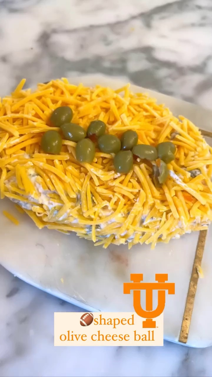 This olive cheeseball is a great game day dish, especially since you can shape it into a football! All you need is one block of softened cream cheese, 1 cup olives, 1 cup shredded cheese, & a packet of ranch seasoning. Mix together, shape into a football, top with more shredded cheese and use halved olives as laces. Refrigerate and serve with crackers or veggies!

#LTKParties #LTKFamily #LTKU