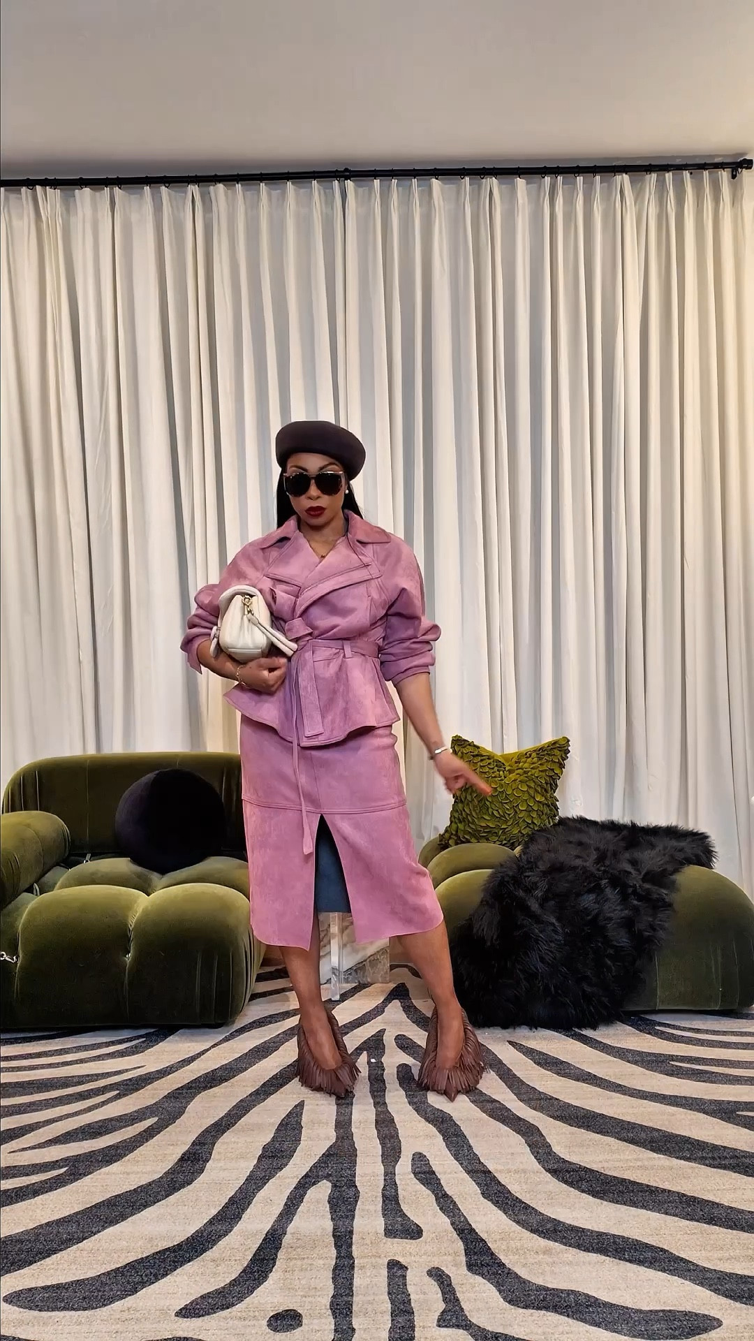 Throwing a fit! 
Defining a new take on this vital two-piece set! This must-have set has been everywhere, but instead of wearing it in a predictable way, I had to run it through my style code. Same foundation, different energy.

I pulled in a brown pillbox hat to sharpen the look and give it that structured, slightly vintage edge. Then added fringe pumps for a little razzle dazzle because if it’s not moving, is it even doing anything?

And let’s talk about this pink and brown combo… soft but grounded, feminine but with depth. It’s giving contrast, it’s giving intention, it’s giving “I didn’t just throw this on.”

Don’t just wear the trend. . . interpret it.

How did I do? Let me know how you’re loving the look down in the comments below. 

For Outfit 🔗s comment “Outfit” below. 

#OOTD #SpringOutfitInspo #EasterOutfit #styleinspo #Fashionover40

#LTKgrwm #LTKootd #LTKOver40