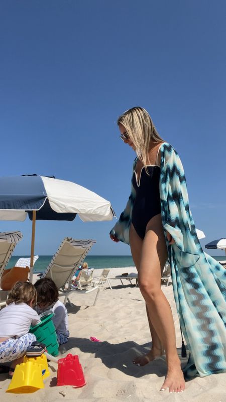 Memorial Day Weekend in Naples! 

Wearing a chic one piece blue swimsuit and blue kimono cover up that can also be tied closed.

The boys are wearing matching fish swim trunks that are on sale this weekend with white rashguard swim shirts. 

Also linking their amazing beach buckets that have a hose that you can pour water out of. 



#LTKKids #LTKStyleTip #LTKFamily