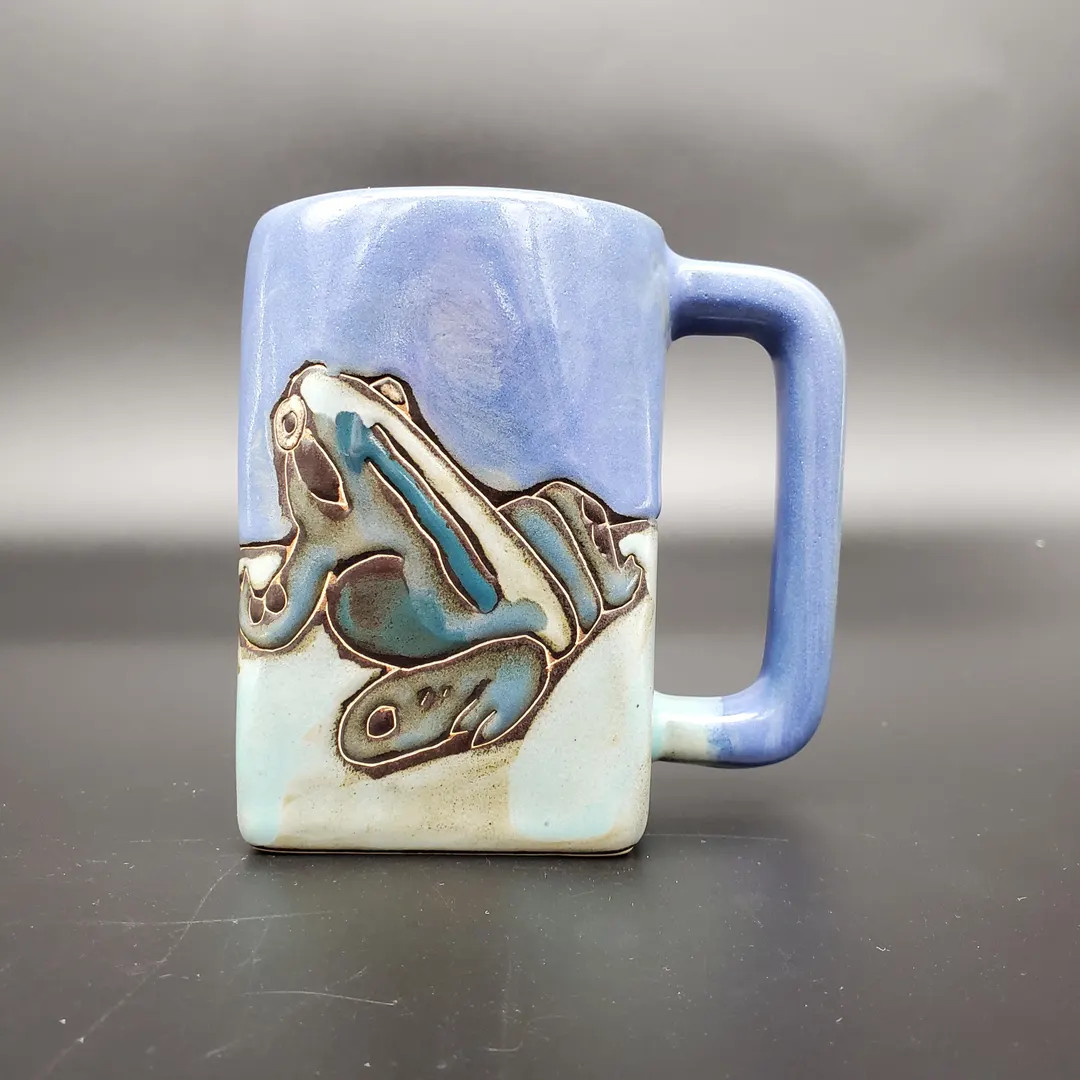 This lovely signed Mara mug has smooth blue and green glazes with beautiful carved frogs on 2 sid... | Etsy (US)