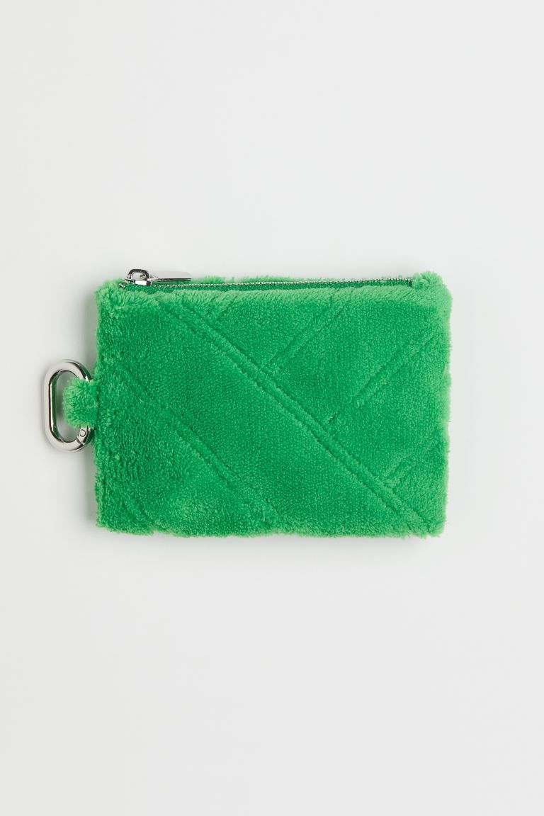 Card case in nylon with a zipper at top and a carabiner hook at one side. Lined. Height 3 1/4 in.... | H&M (US + CA)