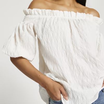 Cream short sleeve textured bardot top | River Island (US)