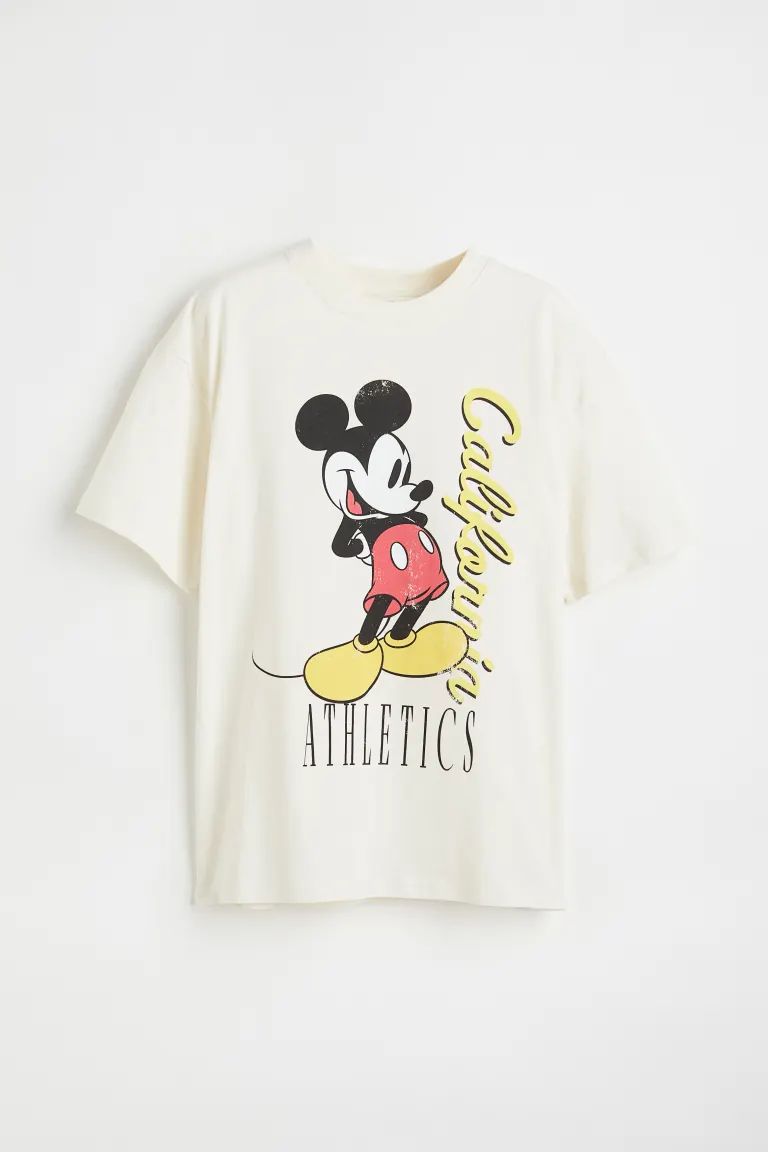 Oversized T-shirt in soft cotton jersey with a printed graphic design at front. Ribbed crew neck ... | H&M (US + CA)