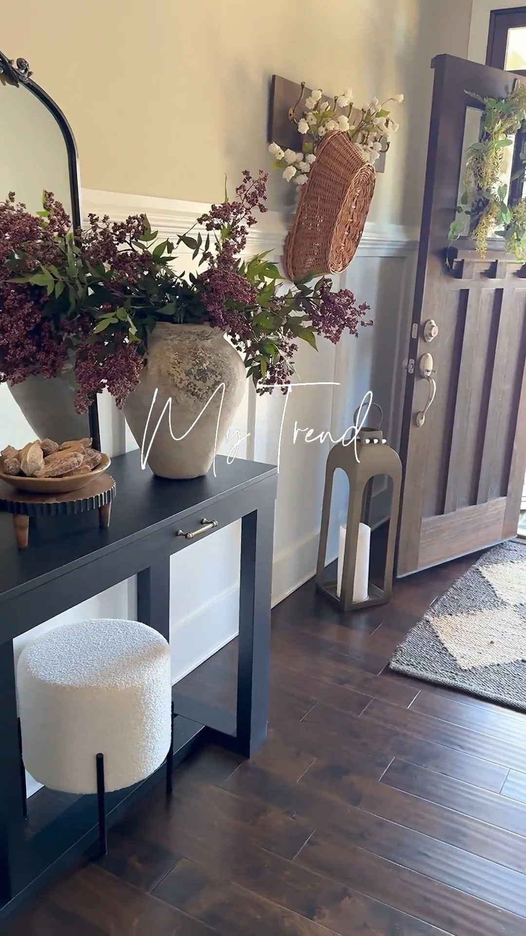 My style is to do what I love and brings me joy!! Spring is almost here and my home is ready🌸

Console table, ottomans, spring florals, wood vase, woven vase, greenery, floral throw pillow, floral throw blanket, round coffee table, woven storage boxes, black candle holders, rabbit snuffer, vintage looking magnifying glass, pineapple snuffer, floor lamp with woven shade, upholstered chair, dusty plum stems, gold lantern, diamond print rug, island pendants, textured curtains, curtain clips, curtain rings, antique gold doorknob, tall flameless candle