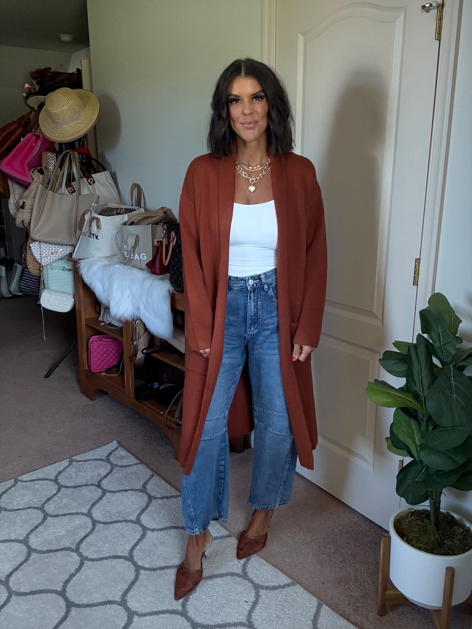 Size small in cardigan and jeans size xs in tank 

#LTKFindsUnder100 #LTKSeasonal