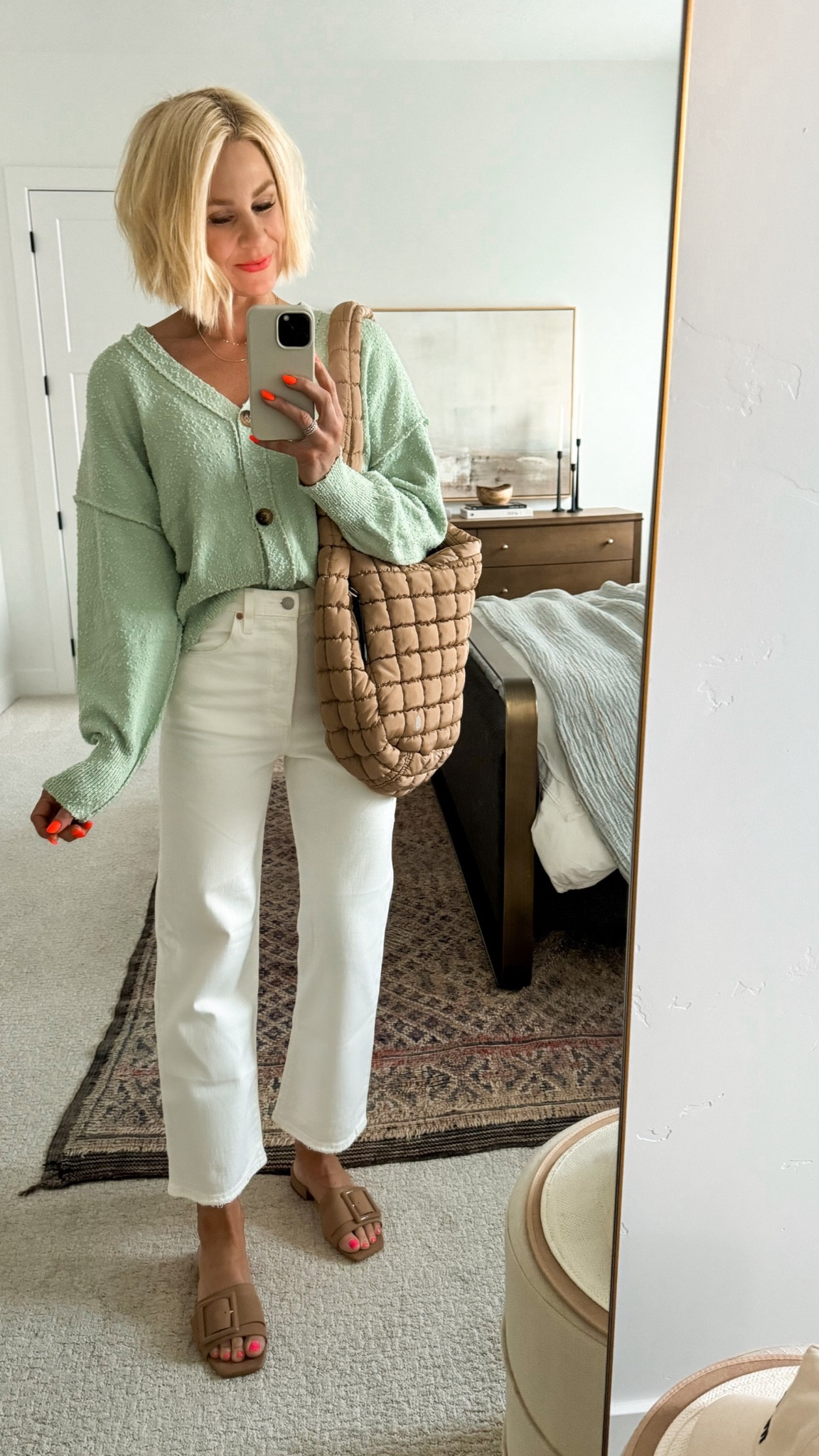 Spring style! This cardigan is one of my favorite FP lookalikes— I would choose it over the FP one, and it’s a fraction of the price. My go-to: (non see through 👍🏼) white jeans, carry all bag, and nude sandals! 
Sizing ~
Cardi:tts, wearing a medium 
Jeans: I ALWAYS suggest sizing up in white jeans! Tight white ain’t cute 😜 (I double checked my tags & these are 28, I always wear a 27)
Shoes: tts
💄: true coral
👉🏼for necklaces email me: hello@bethanybrost.com

#LTKover40 #LTKSpringSale #LTKSeasonal