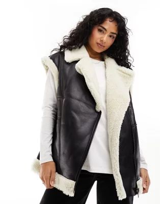 ASOS DESIGN borg faux fur vest in black with contrast borg detail | ASOS | ASOS (Global)