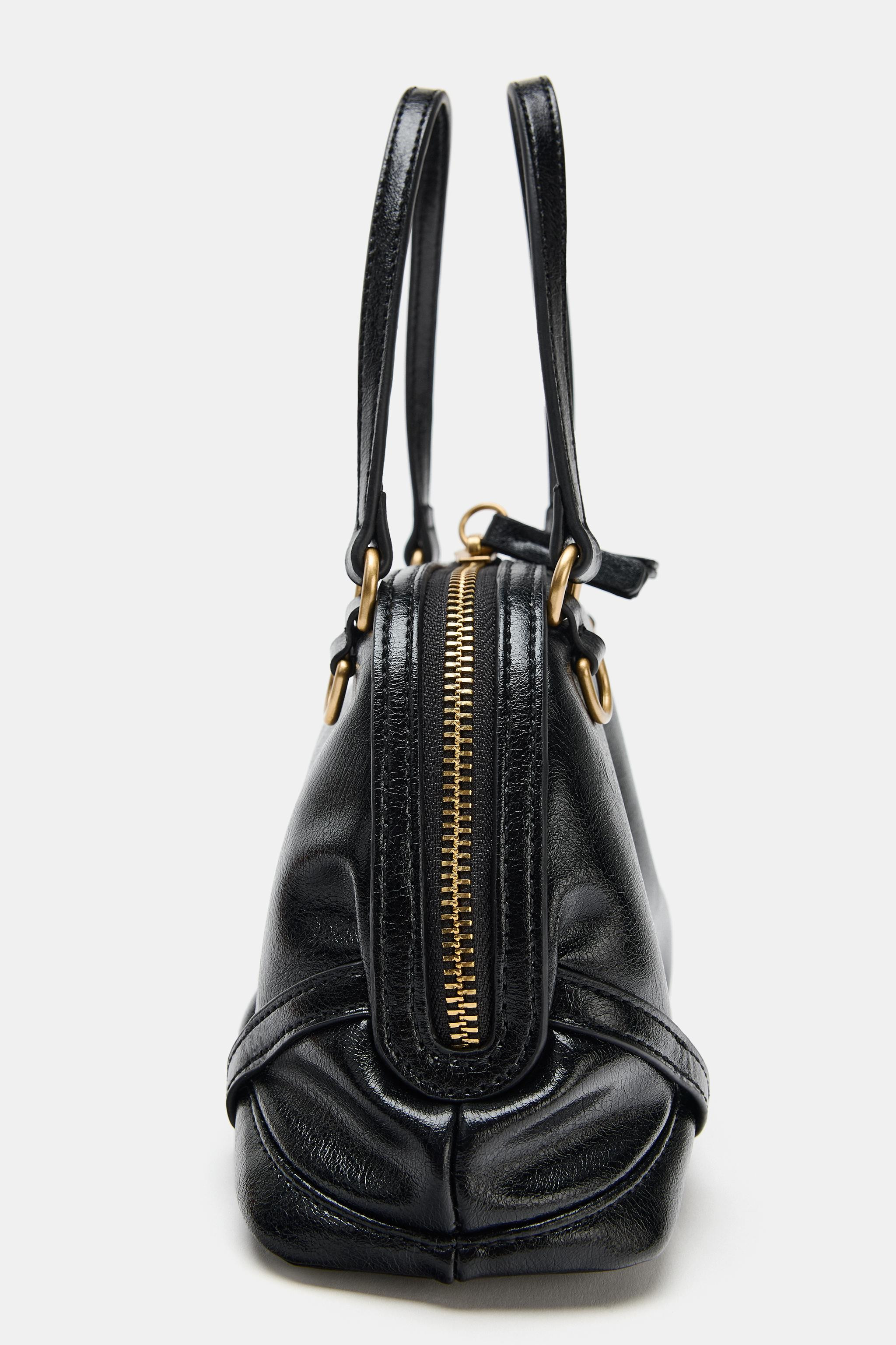 Mini crossbody bag. Double top handles and detachable crossbody strap. Interior zip pocket. Metal... | Zara DE