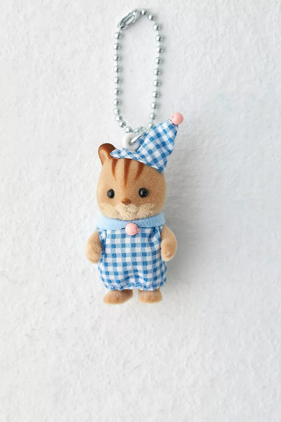 Sylvanian Families Bedtime Walnut Squirrel Keyring | Urban Outfitters UK