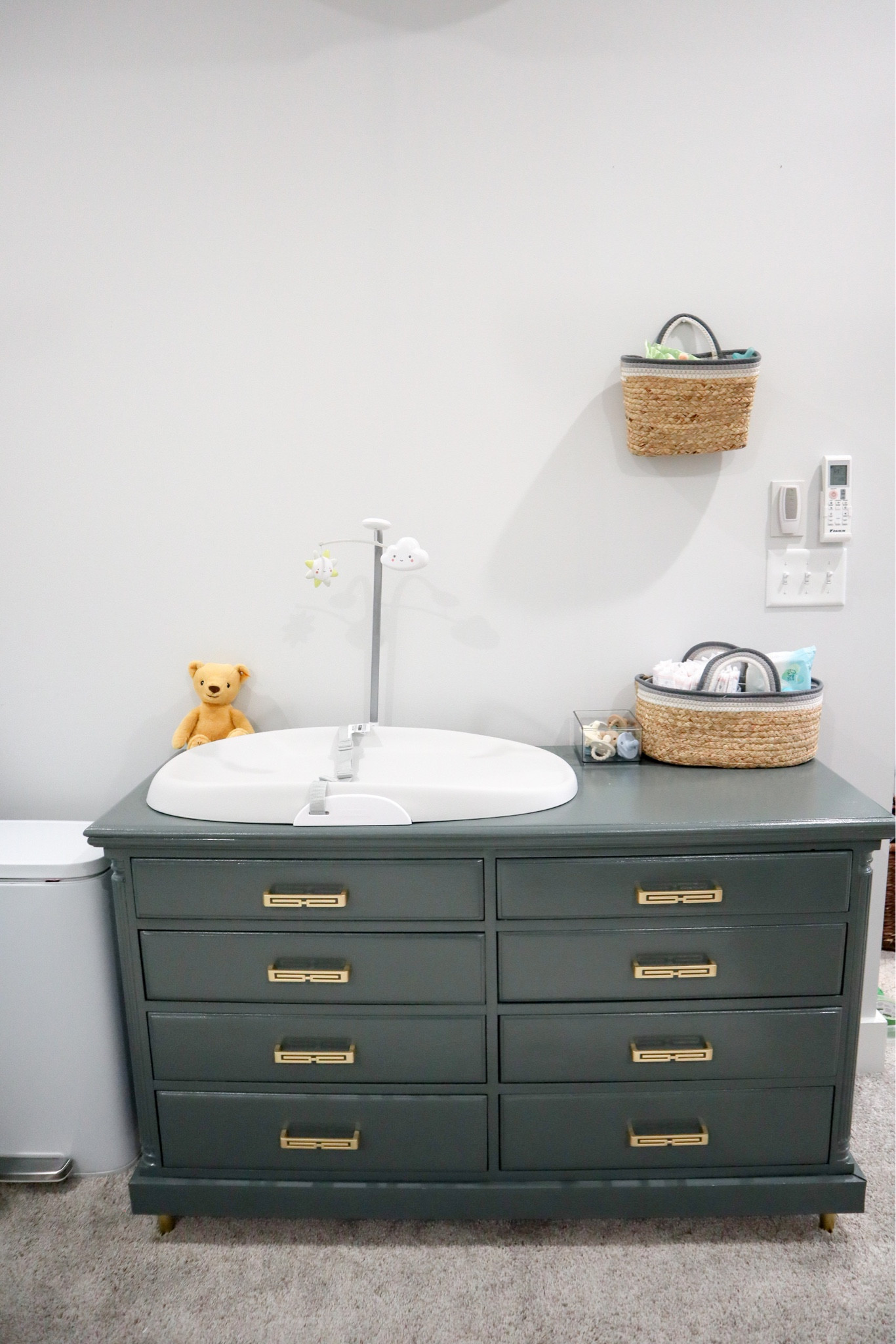 Our changing station has been just the right set up for this nursery! #breezingthrough #breezingthroughnursery #babyboy 

#LTKunder100 #LTKhome #LTKbaby