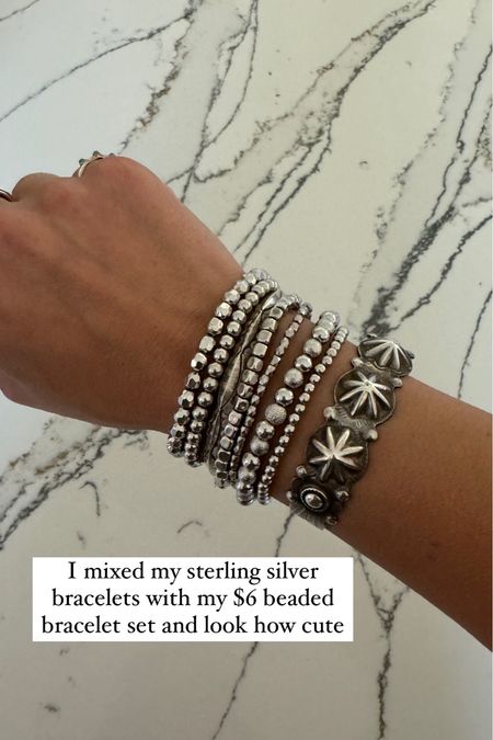 I mixed my $6 beaded bracelet set with my sterling silver bracelets and look how cute!

#LTKmidsize #LTKover40 #LTKstyletip