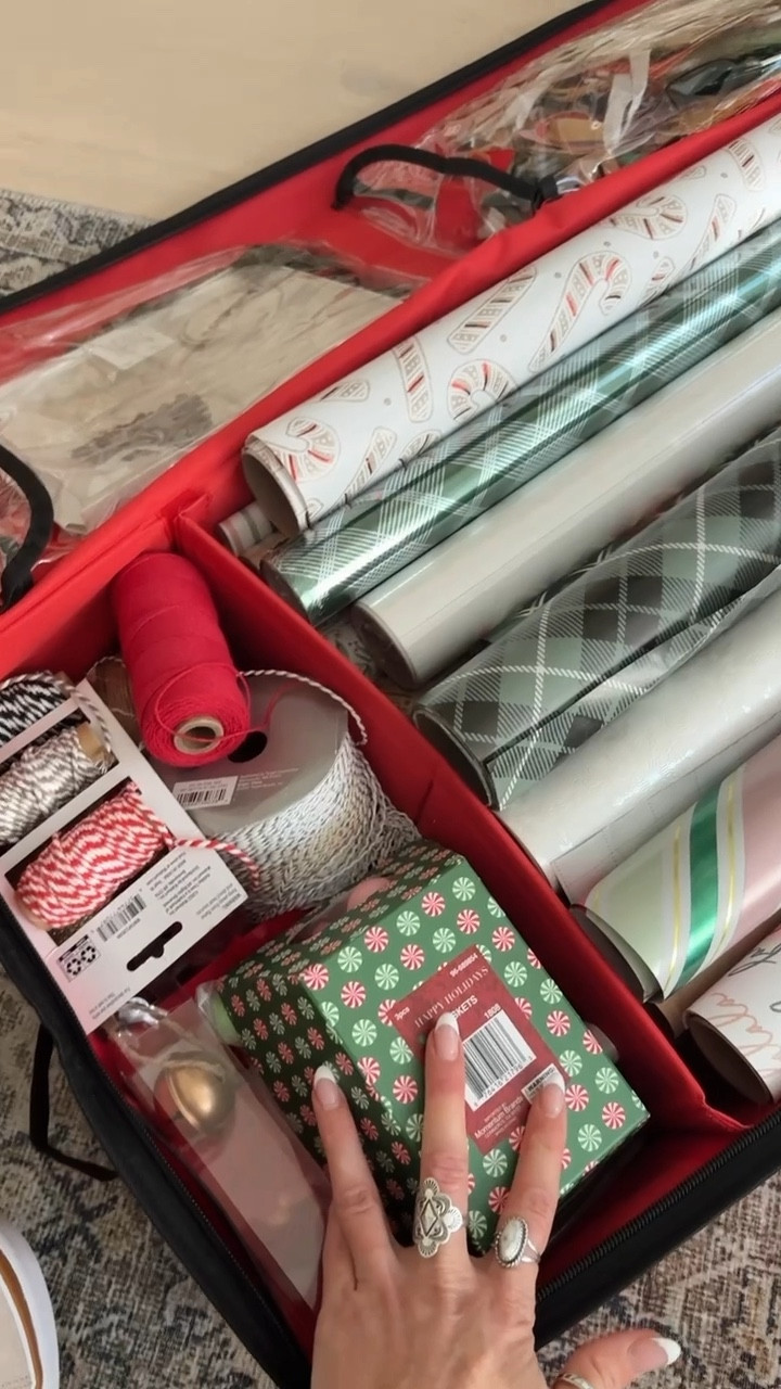 My favorite Christmas gift wrapping storage. 🎁 There’s a place for everything / I love how compact it is to fit in an attic or under a bed. 

#LTKFamily #LTKSeasonal #LTKGiftGuide
