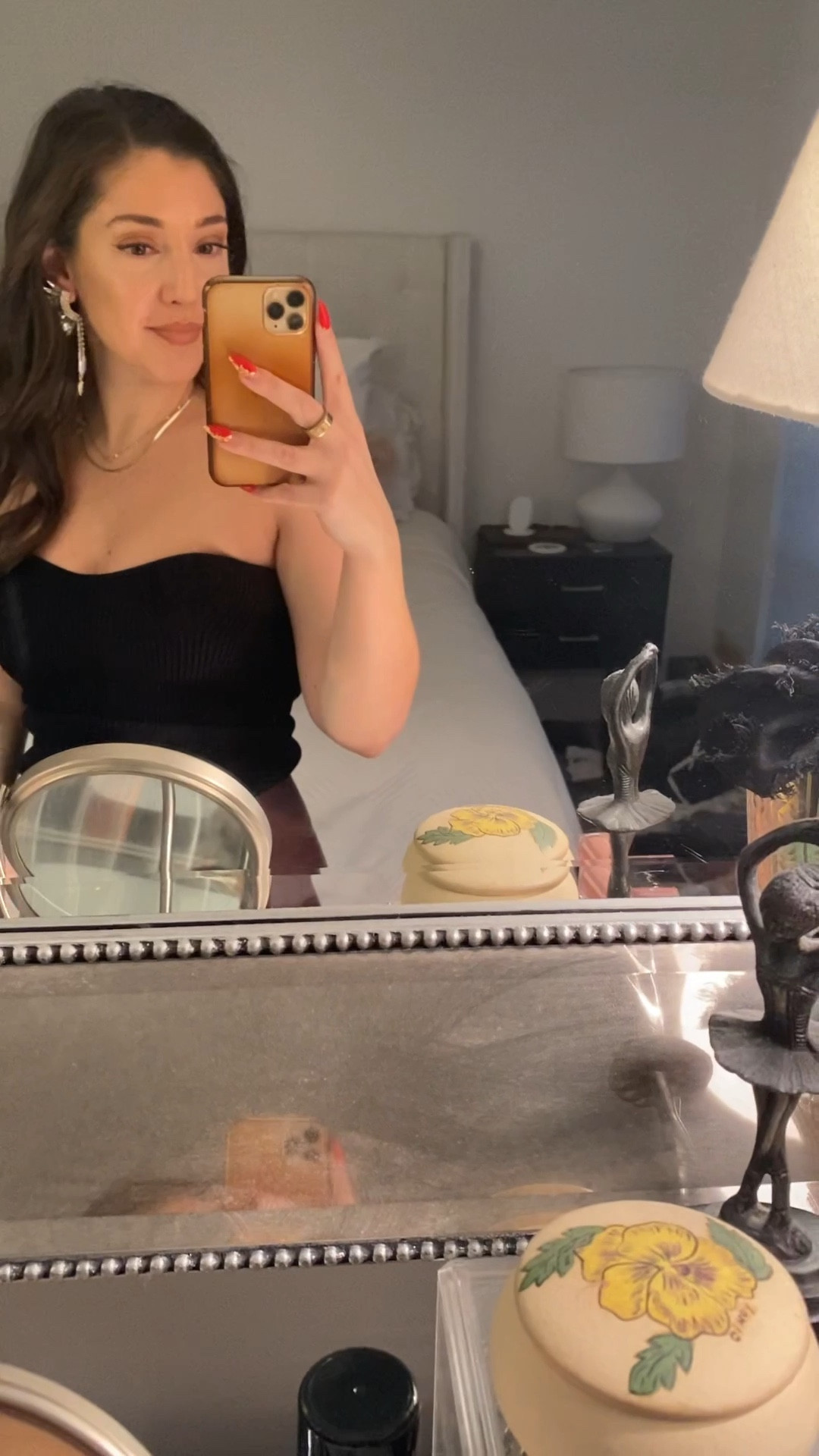 I love this strapless ribbed top by pixie market - it’s sexy but also so versatile. I wore it (size small) with some commando leggings and a blazer. Adding the statement earrings is an easy way to elevate the look to evening  

#LTKstyletip #LTKSeasonal #LTKFind