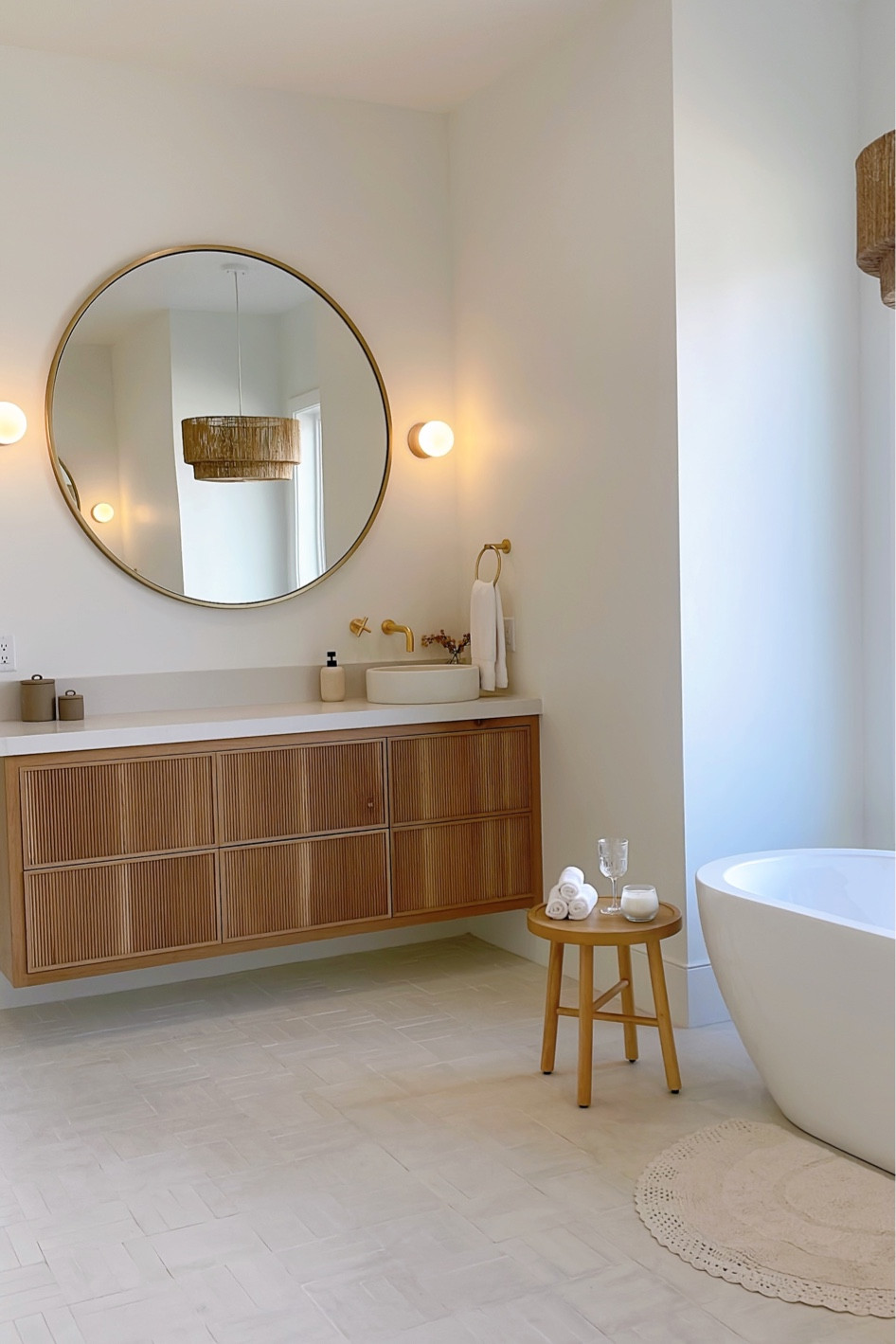 Bathroom styling ✨ 

Vanity, powder bath, bath accessories, soap, canisters, round mirror, gold accents, sconces, stool, spa, towels, home staging 

#LTKfindsunder50 #LTKhome #LTKfindsunder100