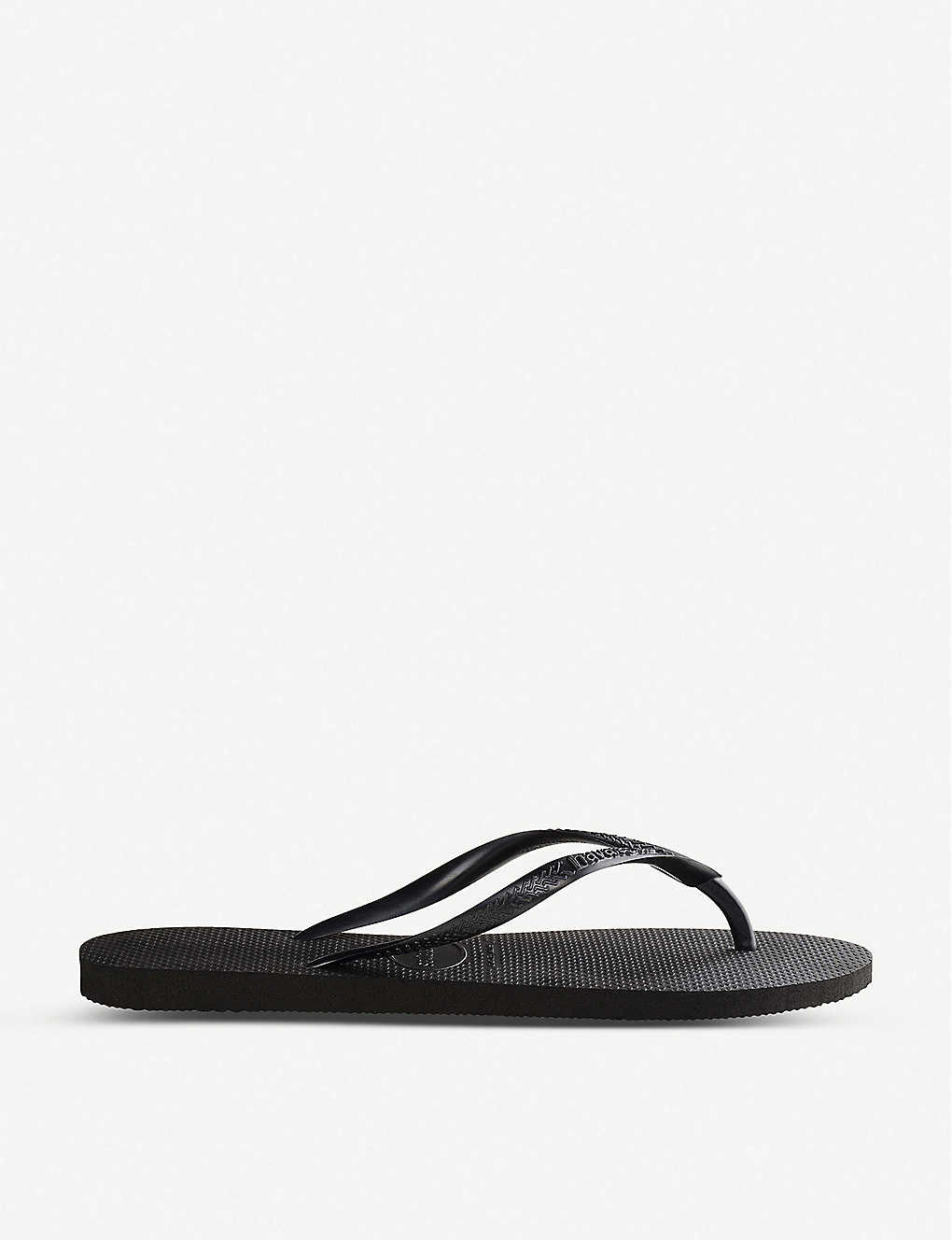 Logo-embellished rubber flip-flops | Selfridges