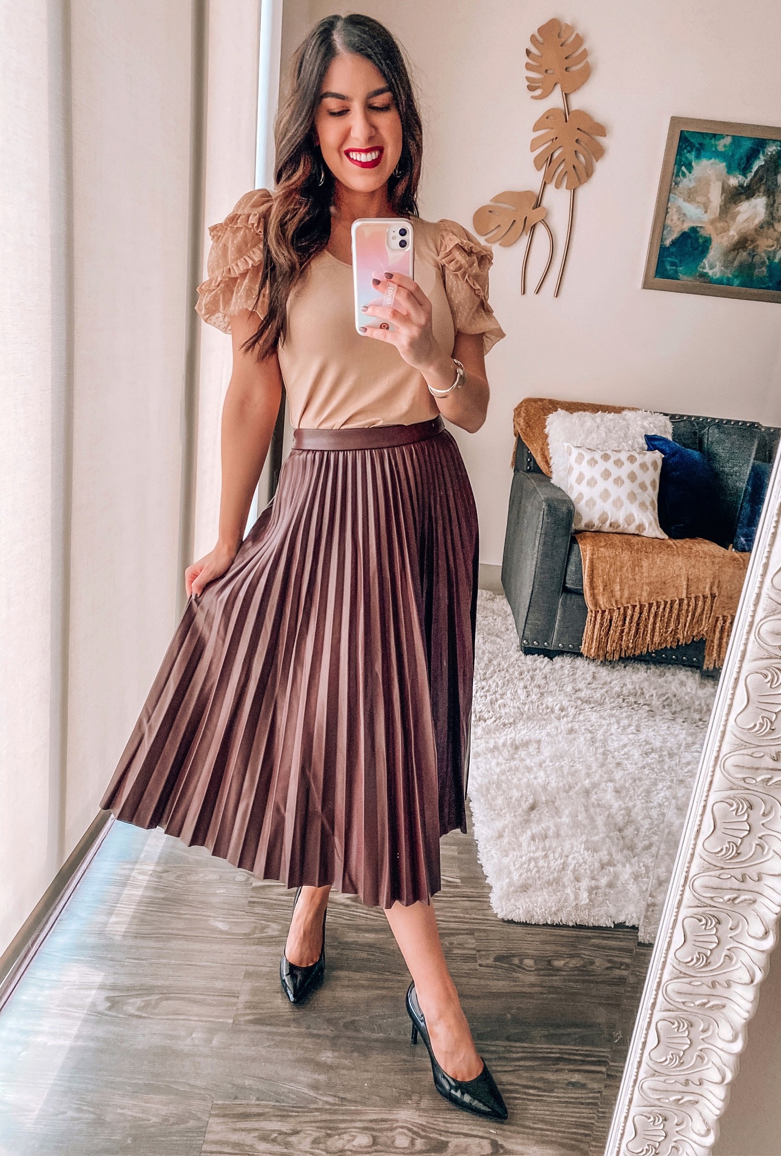 Ruffle top and faux leather pleated midi skirt for the win! This skirt is so classy for the office. Wearing XS. Fits true to size. 

Work Wear Skirt | Work Tops | Work Wear Outfit | Professional Outfit 


#LTKunder100 #LTKworkwear #LTKunder50