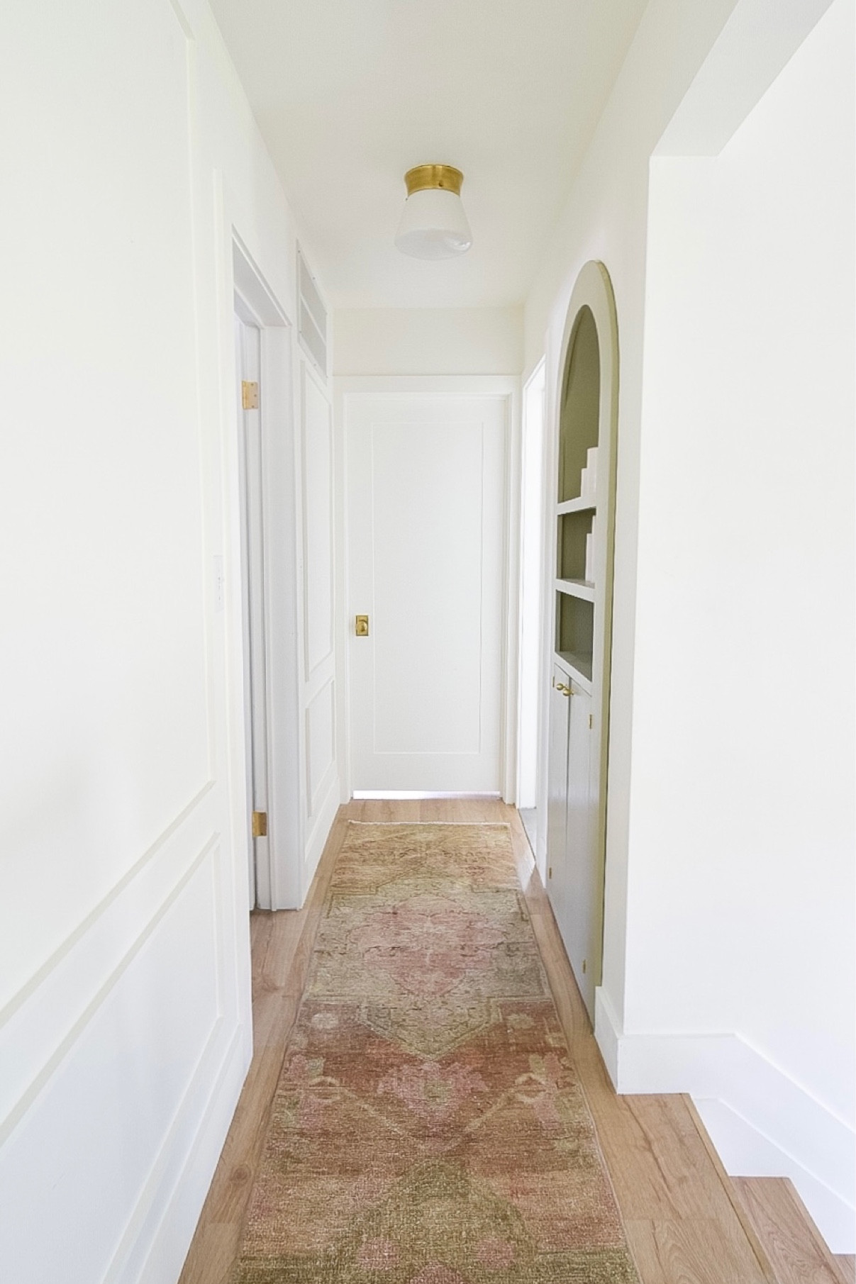 Love all the little brass details in our hallway

#LTKhome #LTKFind