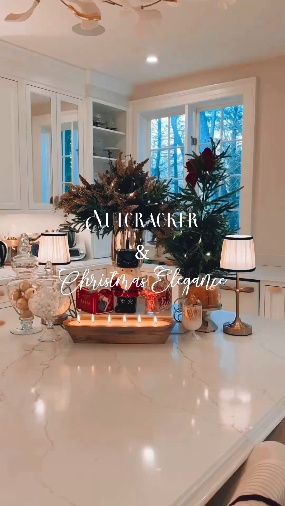 Every season my kitchen island dresses for the occasion, and Christmas is when she insists on making an entrance. This vignette is her holiday ensemble — a little candlelit drama, a cascade of winter greens, and a nutcracker who behaves as though he owns a title deed to Noblewoods. The apothecary jars sparkle, the petite lamps gossip softly among themselves, and the whole scene glows with that unmistakable holiday confidence. It’s my favorite kind of styling: festive, composed, and just extravagant enough to say, ‘yes darling, the season has officially begun.’
Until next time, stay fabulous and chic!

#LTKSeasonal #LTKHoliday
