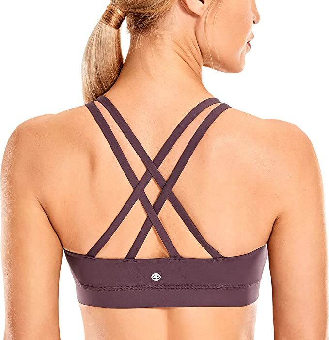 CRZ YOGA Women's Strappy Sports Bras Fitness Workout Padded Yoga Bra Criss Cross Back | Amazon (US)