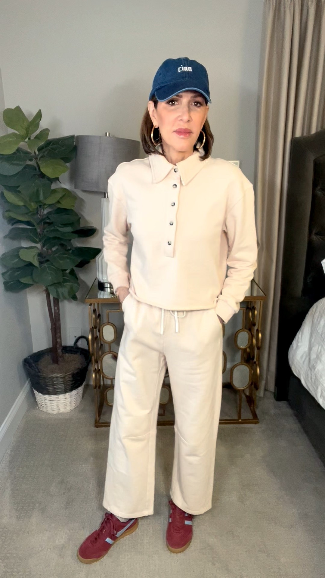 cream pullover, cream barrel leg sweatpants, ciao baseball cap, red sneakers, travel outfit, over 50 outfits 

#LTKootd #LTKOver40 #LTKSeasonal