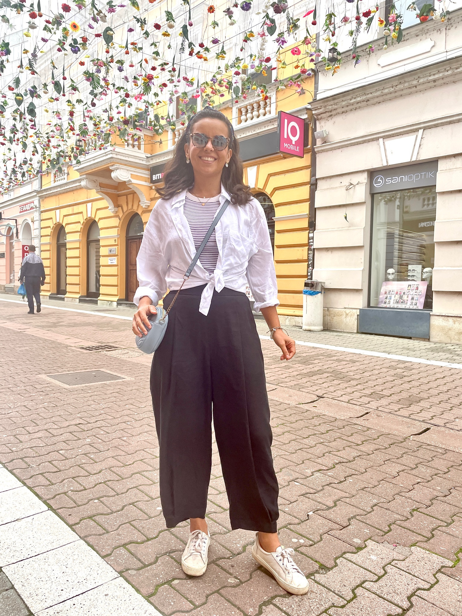 Some of my favorite travel pieces together ☺️ I could not travel without this shirt and white sneakers! Probably the 2 pieces I wear the most!

#LTKstyletip #LTKeurope #LTKtravel