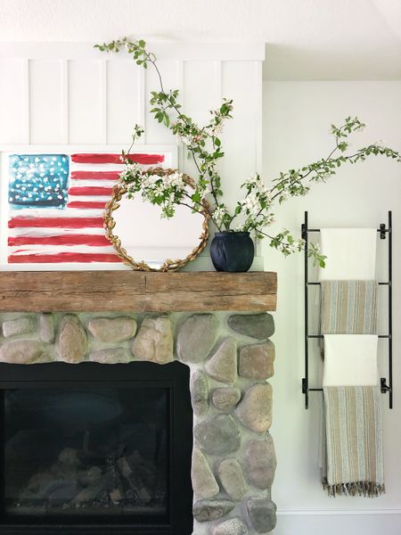 The 4th of July has always been my favorite holiday and during the summer months I love to have a little red white and blue sprinkled throughout the house. I adore this slightly abstract US flag artwork above our fireplace in our sunroom. The pop of red definitely confirms the trending red theory! 

#LTKfindsunder100 #LTKhome #LTKsalealert