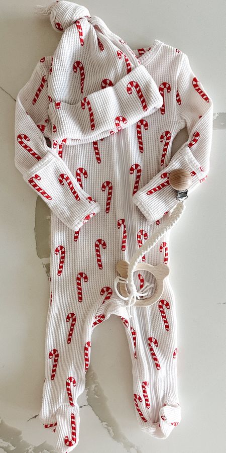 Candy cane onesie with matching hat that is 40% off with code MERRY! Perfect for the holidays and winter.

#LTKsalealert #LTKbaby #LTKCyberWeek