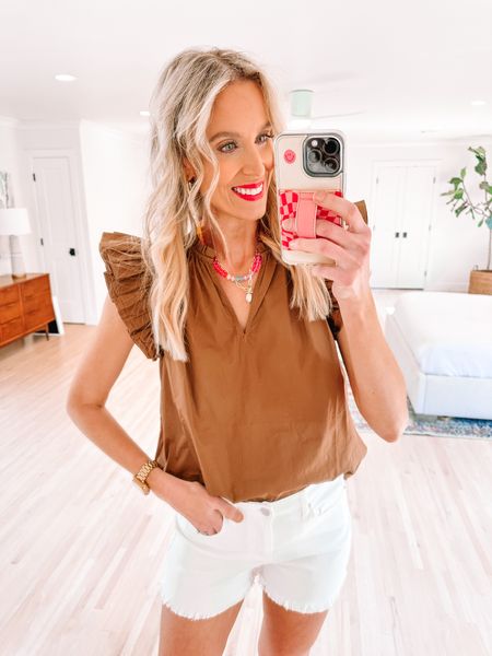 Loving the color of this ruffle sleeve top from Avara! 

Avara / vneck blouse / summer outfit idea / classic style / Anthropologie / white denim shorts 

#LTKFindsUnder50 #LTKFindsUnder100