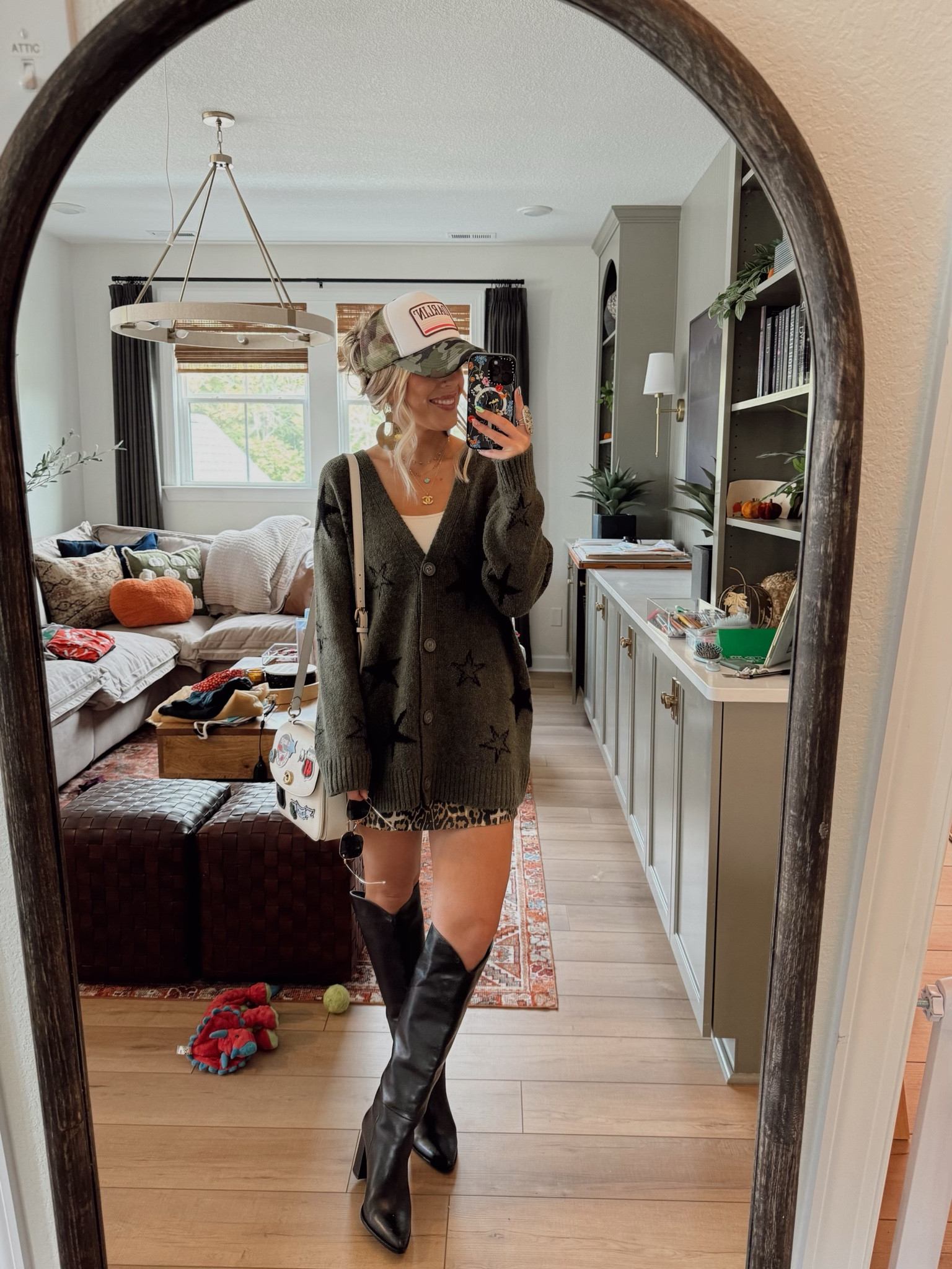 Boots Steve Madden
Skirt vici
Sweater Walmart 
Tank klassy
Earrings twisted silver 
Hat- Wyld Chyld Tees
Purse coach 