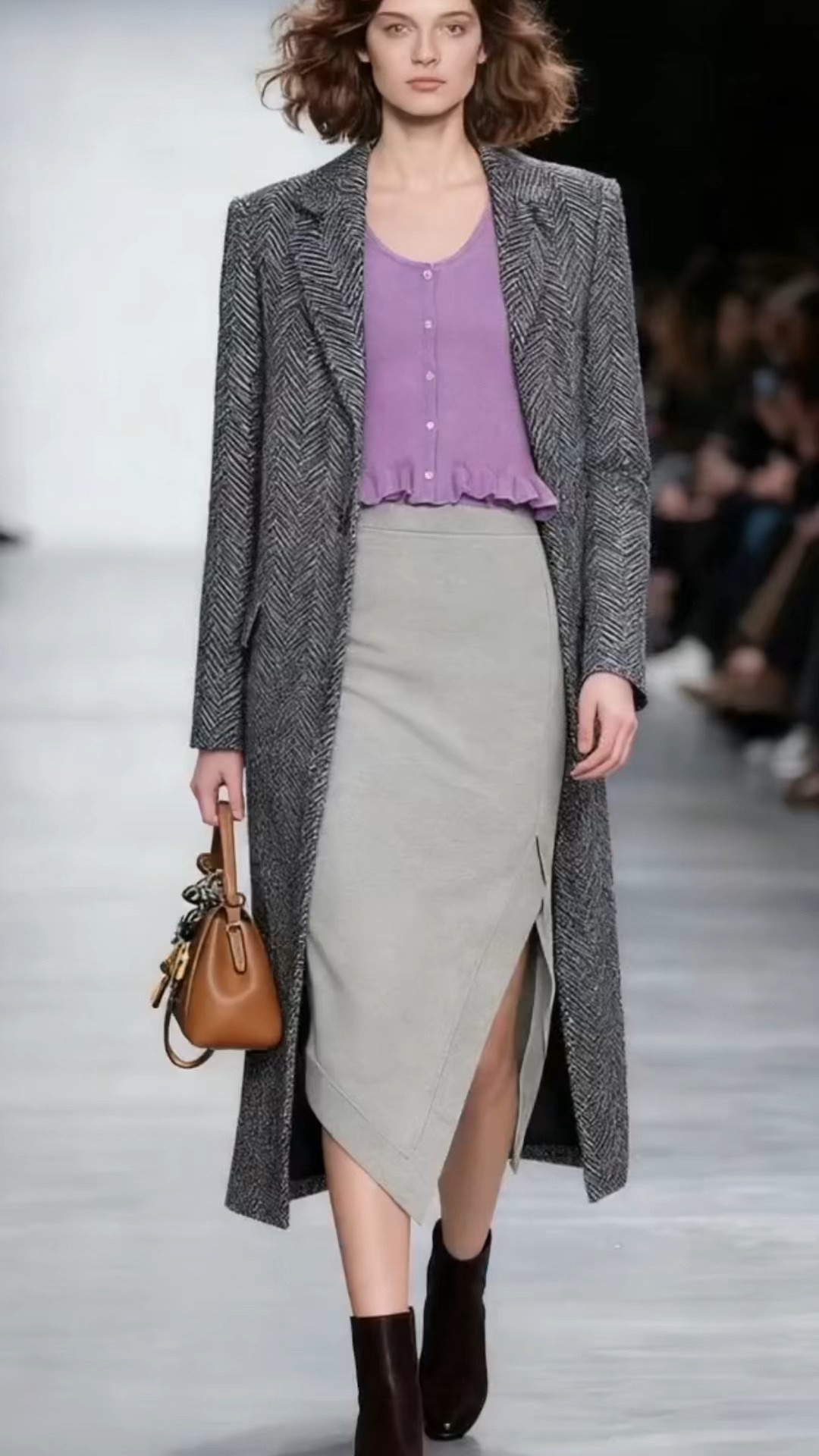 💜 Girls, this French-inspired street style is my new fall coffee run uniform! The cozy herringbone maxi coat brings major chic vibes, paired with a dreamy ruffled lavender cardigan and a sleek grey slit midi skirt. Rich brown ankle boots and a buttery suede tote finish the look for that effortless, put-together feel.

#FrenchStreetStyle #FallWinterOOTD #LavenderCardigan #HerringboneCoat #MidiSkirtOutfit #LTKSeasonal

#LTKootd