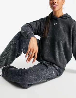 Nike Acid Wash Pack cuffed sweatpants in black | ASOS (Global)