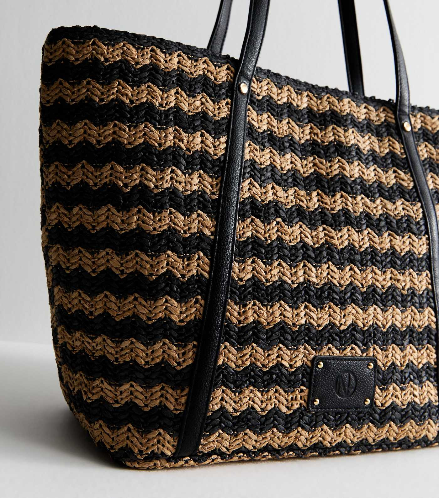 Black Woven Large Tote 
						
						Add to Saved Items
						Remove from Saved Items | New Look (UK)