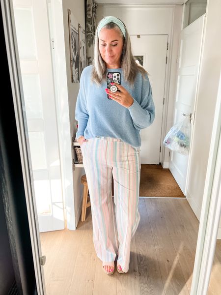 Outfits of the week. Colorful striped wide legged cotton pants (Loavies, L, current) paired with a blue tank top and a blue sweater (Kaos, old)  for the early mornings. Pink sandals (old). Headband Luvvies by Saar. 



#LTKover40 #LTKeurope #LTKworkwear
