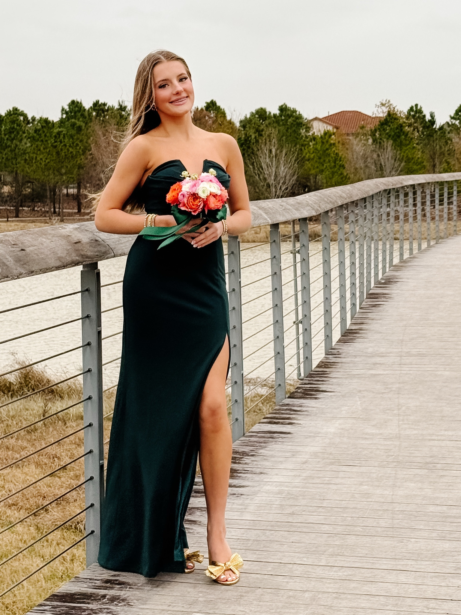 Izzy’s Emerald green Winter Ball dress with the cutest gold bow heels

Prom looks