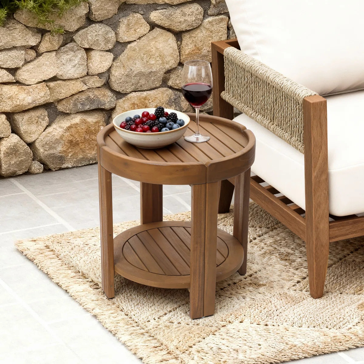 Crafted from solid acacia wood, this round outdoor side table blends natural beauty with practica... | Wayfair North America