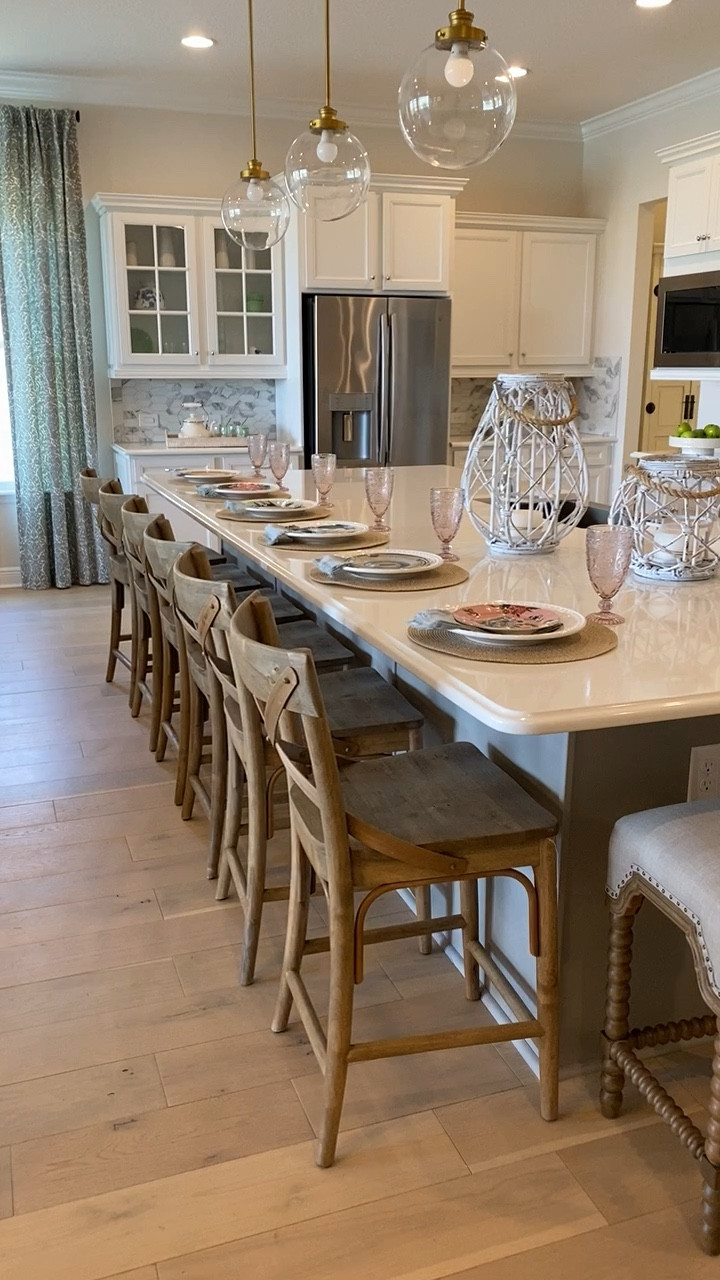 Coastal Kitchen Design with Natural wood Barstools, simple pendant lights and kitchen decor #CoastalKitchen

#LTKhome #LTKstyletip #LTKVideo