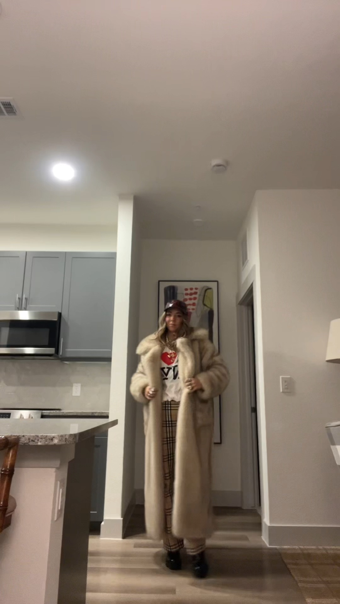 Elevated airport travel outfit 
Coming home from NY !!! This 4th & reckless coat is on sale now!!!

Fur coat, dark red leather baseball cap, Burberry trousers, Gucci boots, gold necklace stack, and I <3 NY tee !!!!

#LTKHoliday #LTKTravel #LTKootd