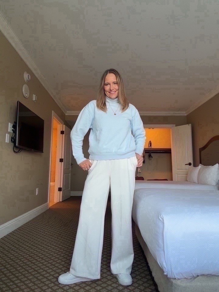 This outfit is perfect for traveling in comfort while still looking put together. The white pants are such a great find and feel amazing for long days on the go. Paired with a classic top, white sneakers, and simple jewelry, it all comes together with ease.

#LTKMidsize #LTKSeasonal #LTKOver40