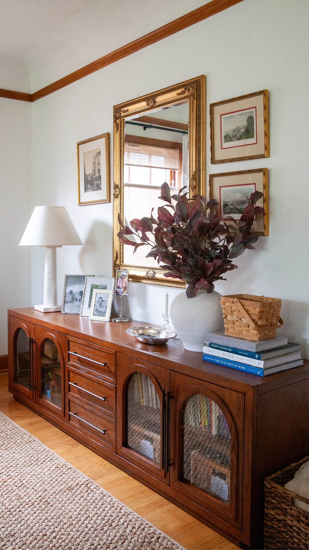 I struggled with this wall for the longest time! I wanted to provide storage but couldn't find something long enough. Finally I found this incredible beautiful oak furniture piece from Hernest. Lots of solid wood details, plus it came fully assembled except for the hardware. I love displaying our family photos on top of it too. The warm tone works really well with my living room, and they have several beautiful wood choices that work in lots of different styles, all super affordable. 

So happy to have this elegant toy and book storage! 

#LTKHome