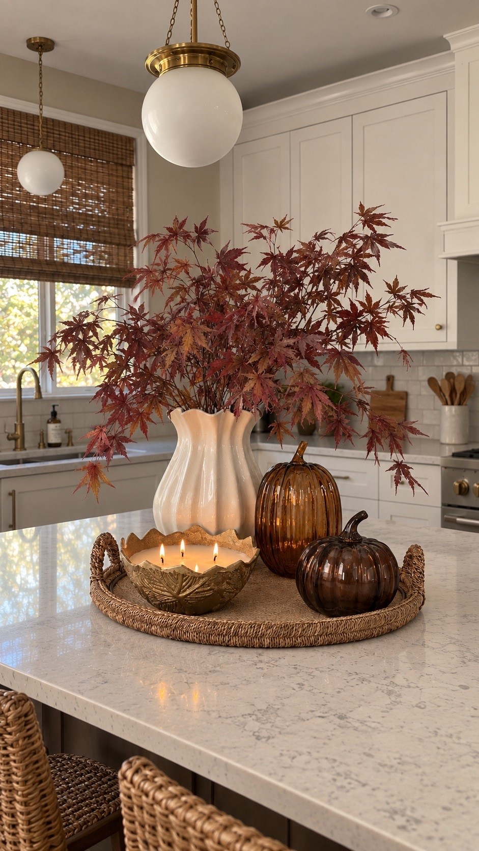 Creating a cozy fall kitchen one Target find at a time 🤎 This woven tray arrangement brings together warm glass, natural texture and autumn foliage for an elevated seasonal look.
