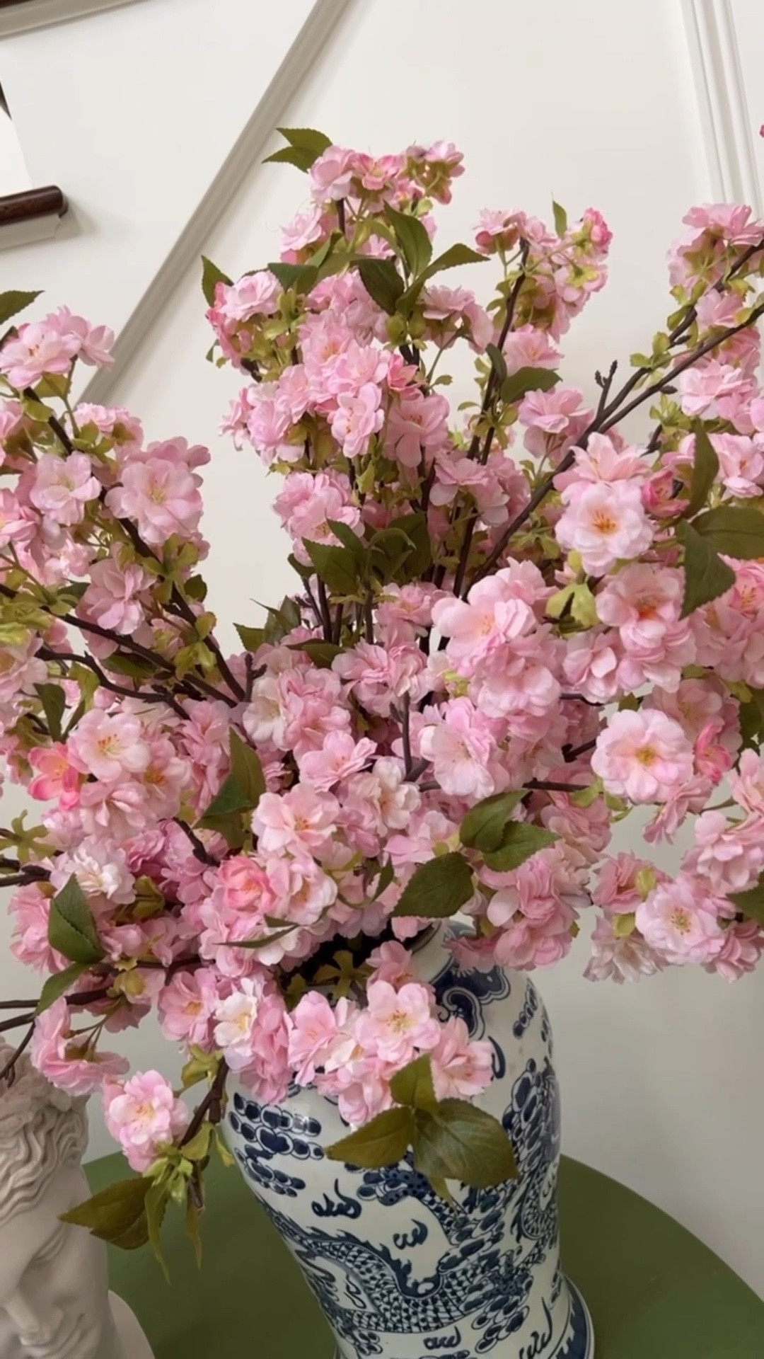 Styling my entryway with cherry blossoms to welcome spring. I love the quality from these and I’ve been following them for some time now. @alicelanehome always has the perfect accessories for the home. 

#LTKHome #LTKSeasonal