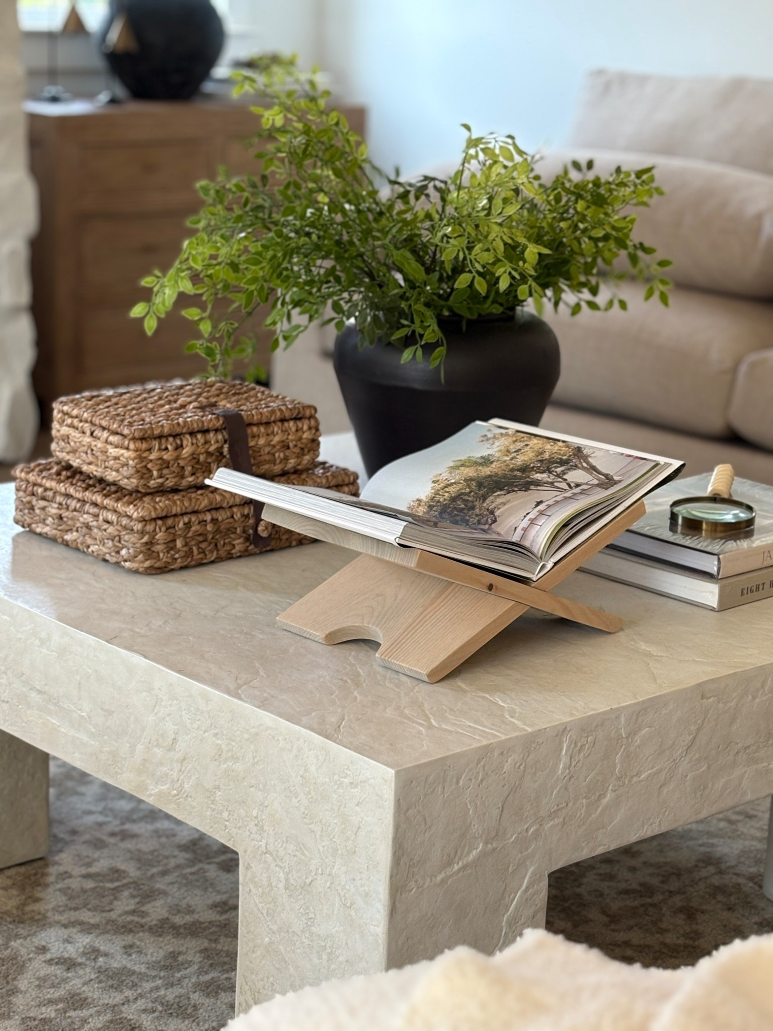 ✨ Coffee table styling that feels elevated yet effortless. I love layering textures—like these woven baskets, a sculptural vase of greenery, and my go-to McGee & Co book stand—for a timeless and cozy living room look. Perfect for curling up with a design book or creating that styled-but-livable vibe. 🌿

Shop my favorite McGee & Co pieces + affordable dupes to get this same look in your home. 🏡

#McGeeAndCo #CoffeetableStyling #LivingRoomDecor #OrganicModern #NeutralHome #HomeInspo #LTKhome #LTKstyletip #LTKcoffeetable 

 #LTKHome