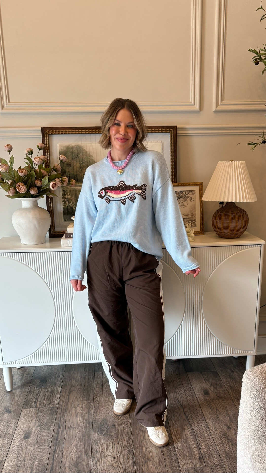 Spring ootd! 
Loving this fish sweater that happens to be on sale! These brown track pants from Walmart are so affordable and so good! My necklace is new and I am obsessed, it has many color options! 
#ootd #springoutfit #outfitidea #casualoutfit #trackpants #fishsweater #walmartoutfit #amazonfashion #targetoutfit #springoutfit #salealert #beadednecklace 


#LTKSaleAlert #LTKootd #LTKSeasonal