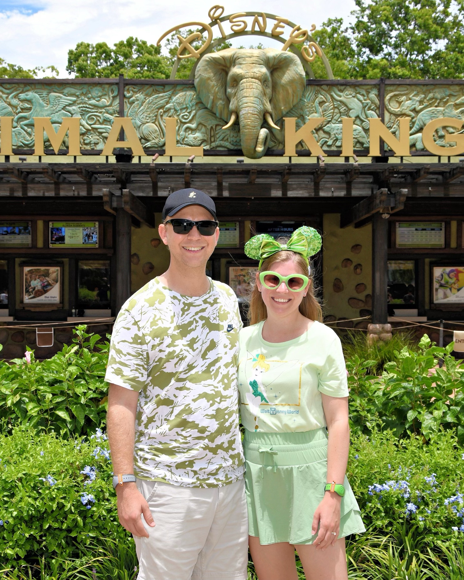 Green Disney outfits for him and her at Animal Kingdom  