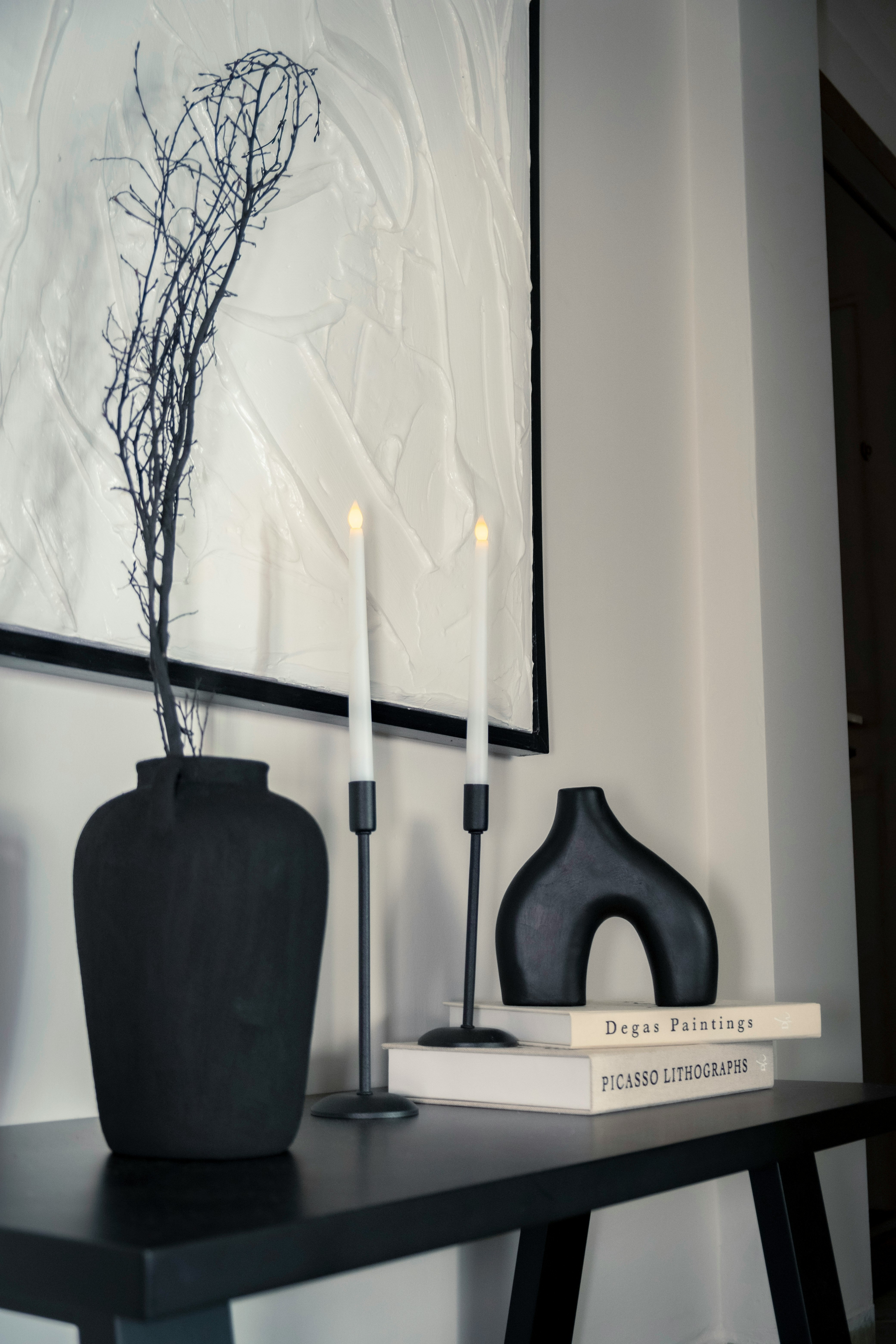 Modern home decor inspiration, console table, entryway, black and white, candles, vase, decorative books, living 

#LTKHome #LTKU #LTKdayinmylife